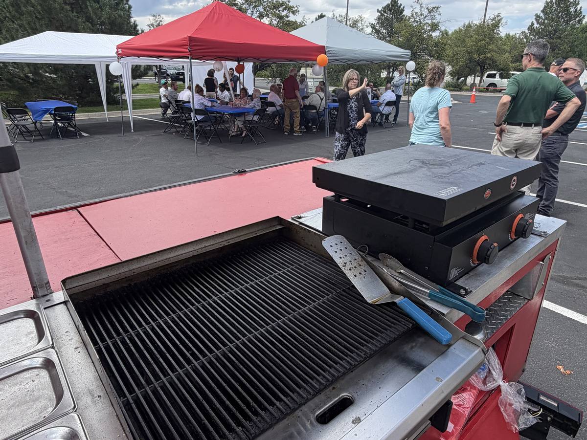 Close up of the Devil Dog Grill griddle and cart setup