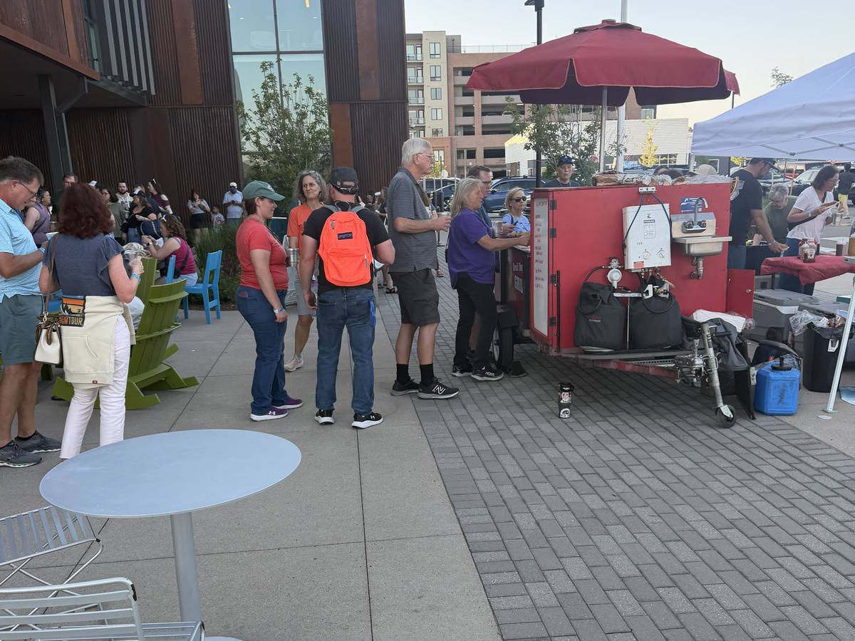 Devil Dog Grill team serving guests at an event